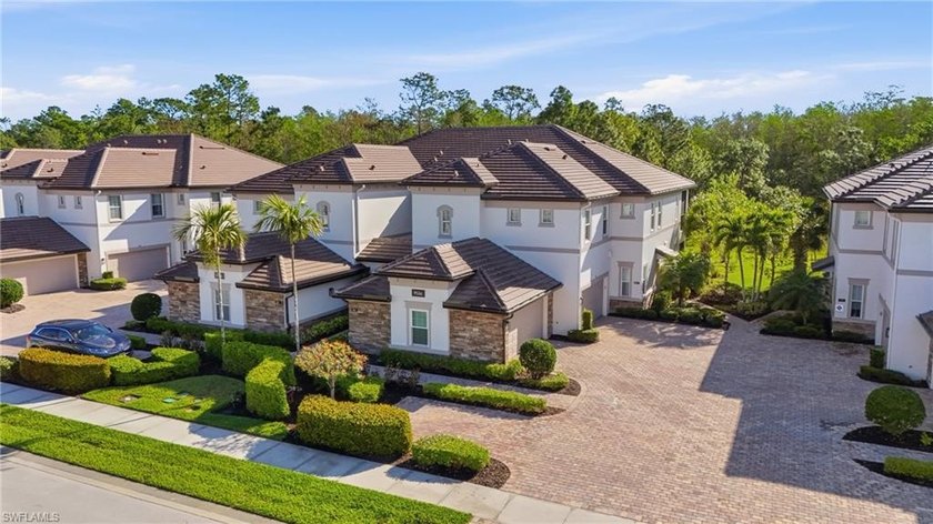 Top-floor Coach Home with 2-car garage. Tucked away in the - Beach Condo for sale in Naples, Florida on Beachhouse.com