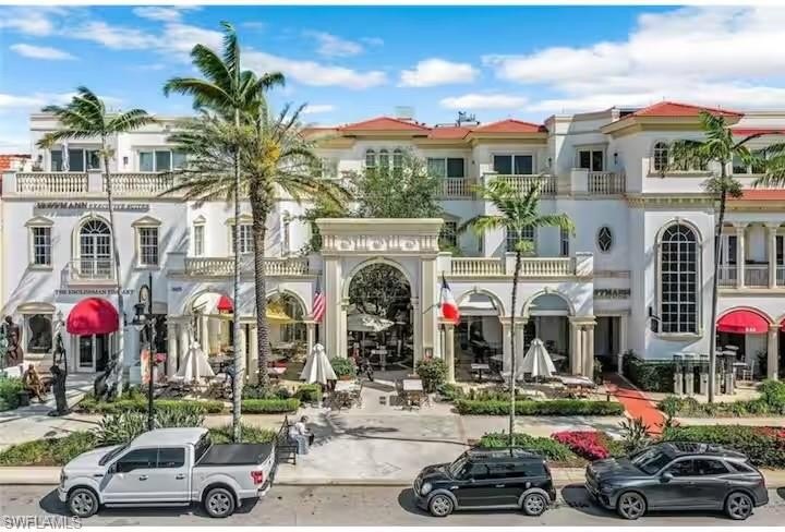 Perfectly positioned along iconic 5th Avenue South, this - Beach Condo for sale in Naples, Florida on Beachhouse.com