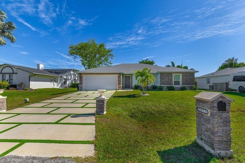 Experience modern elegance with this Newest Construction. From - Beach Home for sale in Port Saint Lucie, Florida on Beachhouse.com