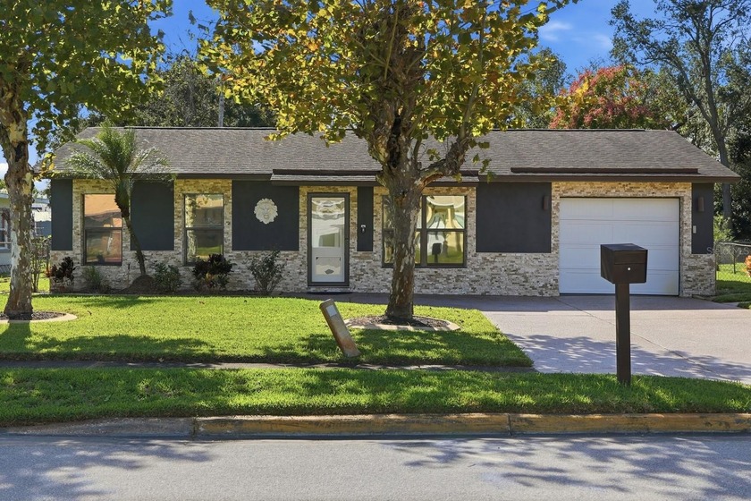 Welcome to this beautifully updated and move-in ready home in a - Beach Home for sale in Daytona Beach, Florida on Beachhouse.com