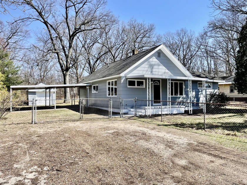 83 private wooded acres, 3 bed 1 bath, w/garage & attached - Beach Home for sale in Norton Shores, Michigan on Beachhouse.com