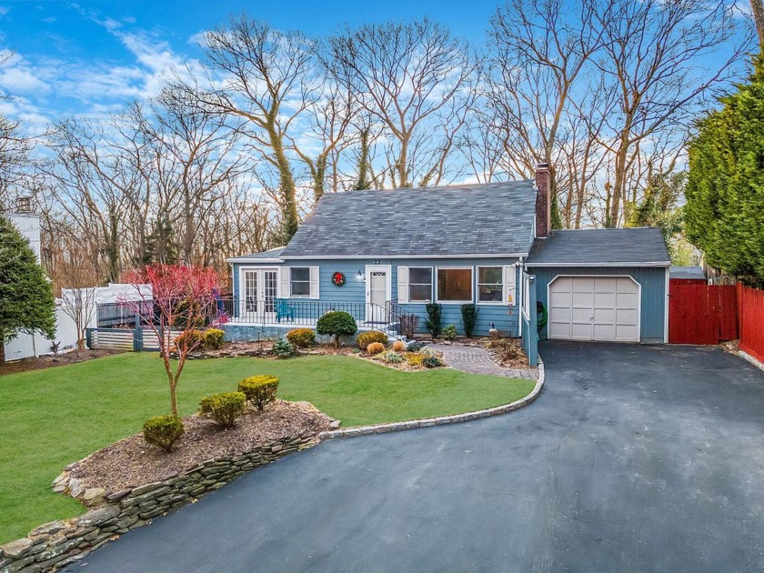 Cozy up by the fire and enjoy the charm that this lovely cape by - Beach Home for sale in Sound Beach, New York on Beachhouse.com