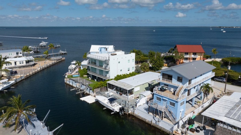 MULTI FAMILY OPPORTUNITY! Water view from every floor! Prime - Beach Home for sale in Key Largo, Florida on Beachhouse.com