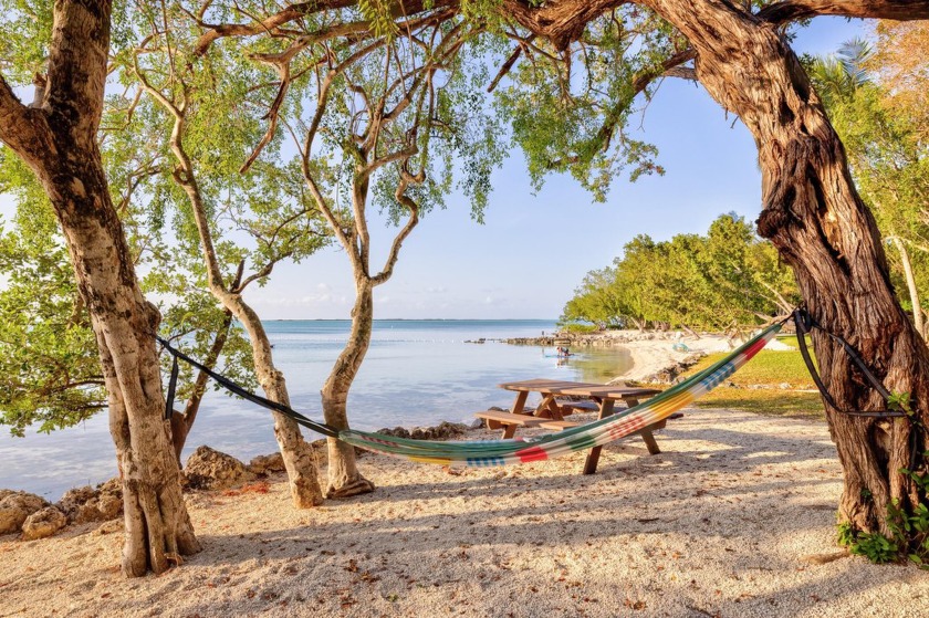 Waterfront Corner Gem with Boat Slip at Your Back Door!Live the - Beach Home for sale in Key Largo, Florida on Beachhouse.com