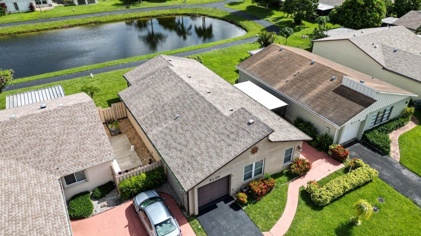 Welcome to this dream lake front living! Nestled in 55+ gated - Beach Home for sale in Boynton Beach, Florida on Beachhouse.com