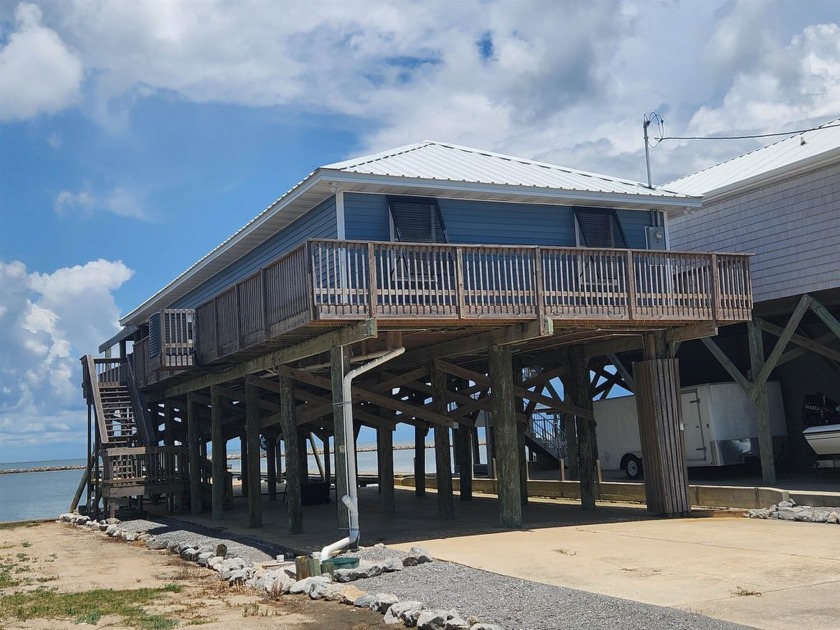 Whether you're a boating enthusiast or simply want to enjoy life - Beach Home for sale in Grand Isle, Louisiana on Beachhouse.com