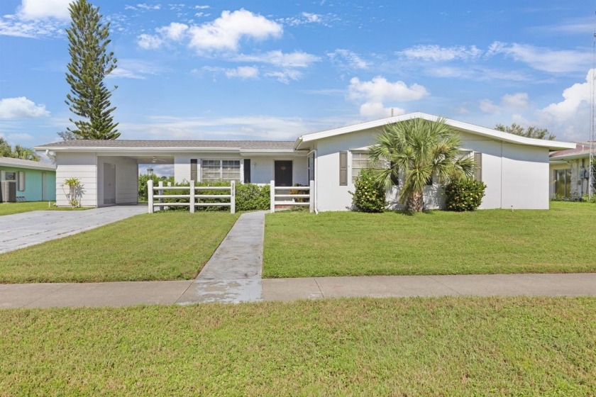 Welcome to this inviting 1963 two-bedroom, two-bathroom home - Beach Home for sale in Port Charlotte, Florida on Beachhouse.com