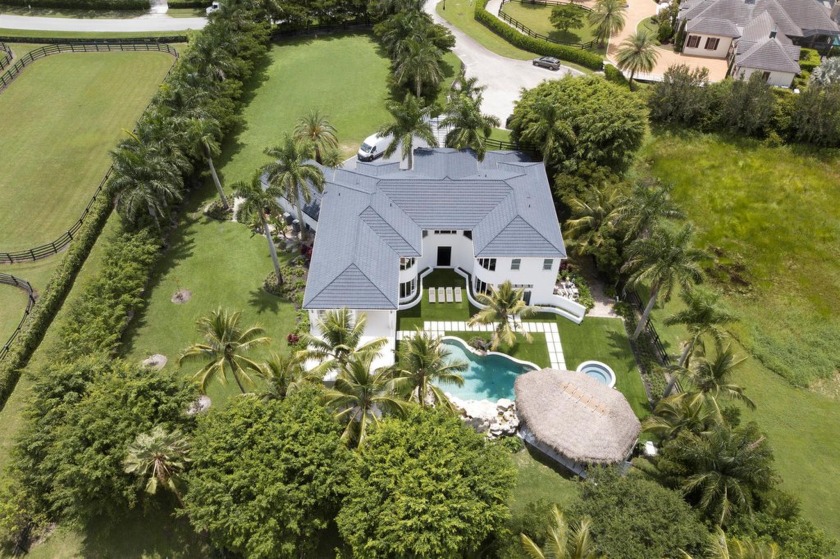 This incredible contemporary estate sits on a 1.4 acre lot in - Beach Home for sale in Wellington, Florida on Beachhouse.com