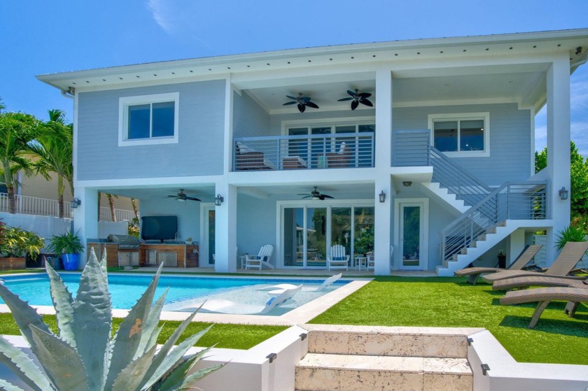 LUXURY CANAL FRONT HOME IN ISLAMORADA!Brand new offering of the - Beach Home for sale in Lower Matecumbe Key, Florida on Beachhouse.com