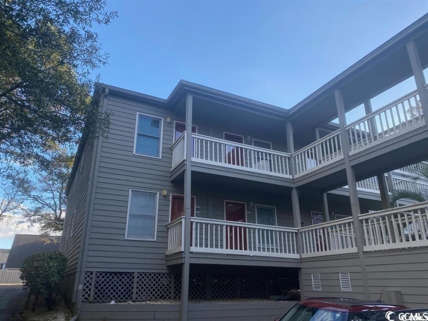 Enjoy the courtyard style living in this end unit at Ocean Winds - Beach Condo for sale in North Myrtle Beach, South Carolina on Beachhouse.com