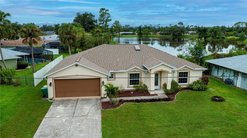 GET READY TO FALL IN LOVE with the ultimate lakeside retreat - Beach Home for sale in Punta Gorda, Florida on Beachhouse.com