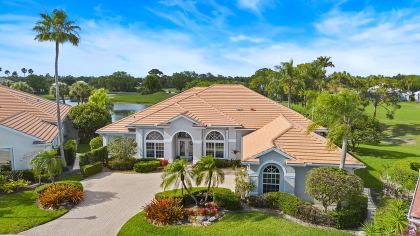 New in Monarch Country Club this elegant custom estate home - Beach Home for sale in Palm City, Florida on Beachhouse.com