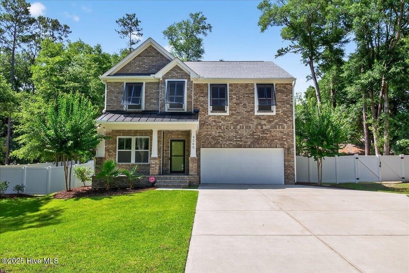 Wow! This beautiful brick faced 3 bed, 2.5 bath home in the - Beach Home for sale in Calabash, North Carolina on Beachhouse.com