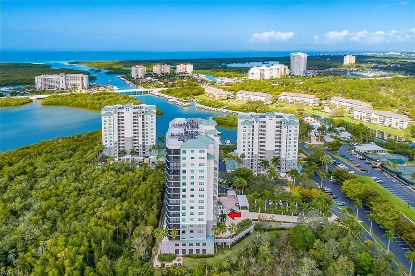 Rarely available 5th-floor corner end unit (Stack 04) in Caribe - Beach Condo for sale in Naples, Florida on Beachhouse.com