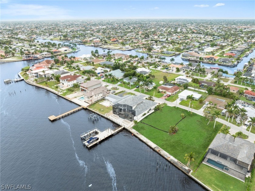 Brand new seawall to be installed 2' higher than current code - - Beach Lot for sale in Cape Coral, Florida on Beachhouse.com