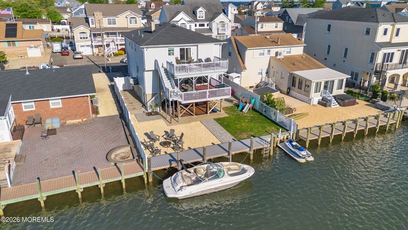 Experience the best of waterfront living in Silver Bay.  This - Beach Home for sale in Toms River, New Jersey on Beachhouse.com