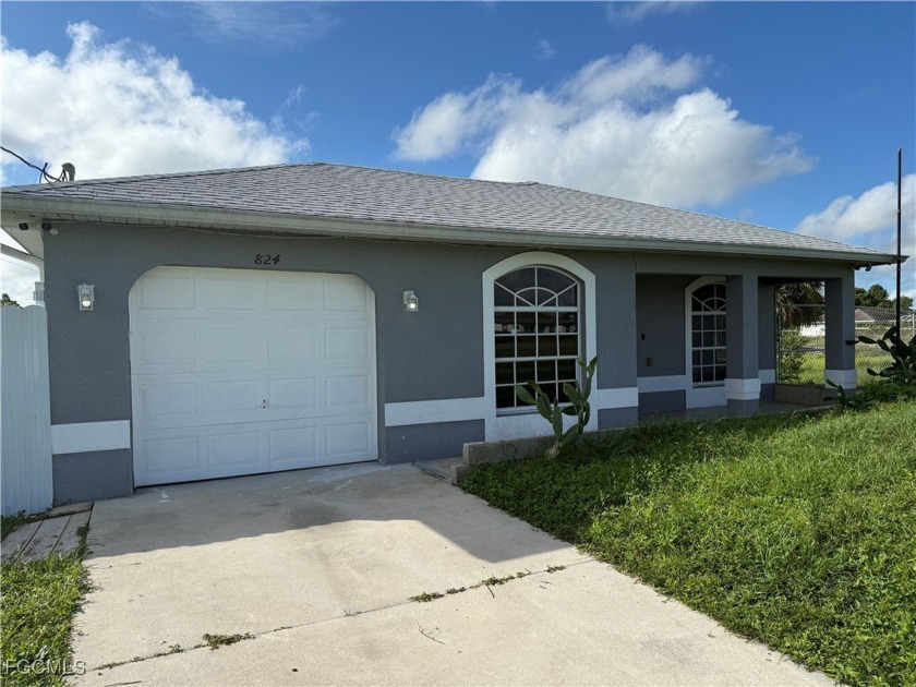 TRIPLE LOT OPPORTUNITY IN LEHIGH ACRES! Move-in ready 3 bed/2 - Beach Home for sale in Lehigh Acres, Florida on Beachhouse.com