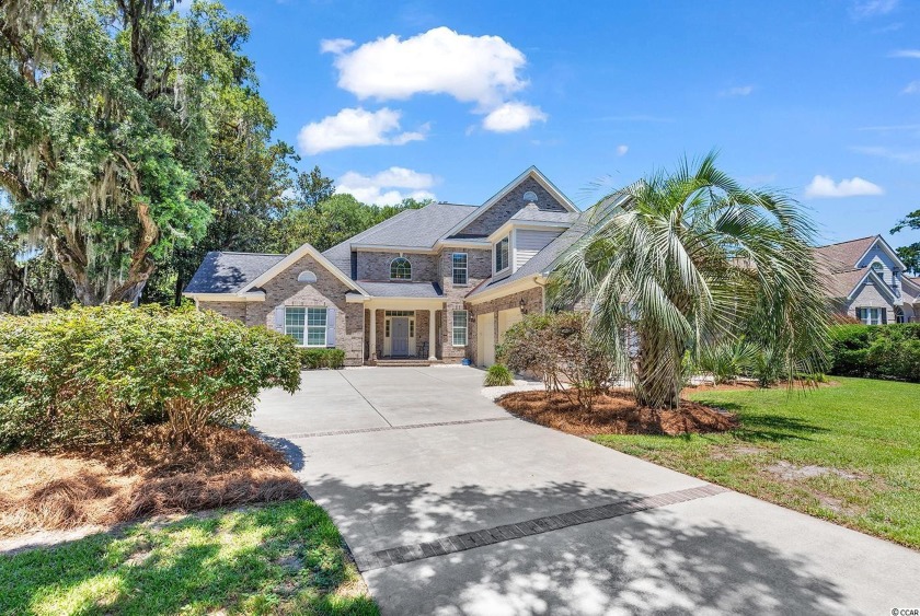 This impeccably designed home is situated on .48 acres in - Beach Home for sale in Pawleys Island, South Carolina on Beachhouse.com