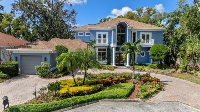 Located on a quiet cul-de-sac on a lushly landscaped waterfront - Beach Home for sale in Tampa, Florida on Beachhouse.com