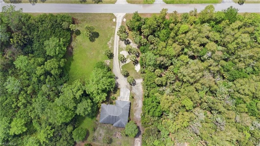 Welcome to 5681 Bur Oak Lane, an exceptional opportunity nestled - Beach Acreage for sale in Naples, Florida on Beachhouse.com