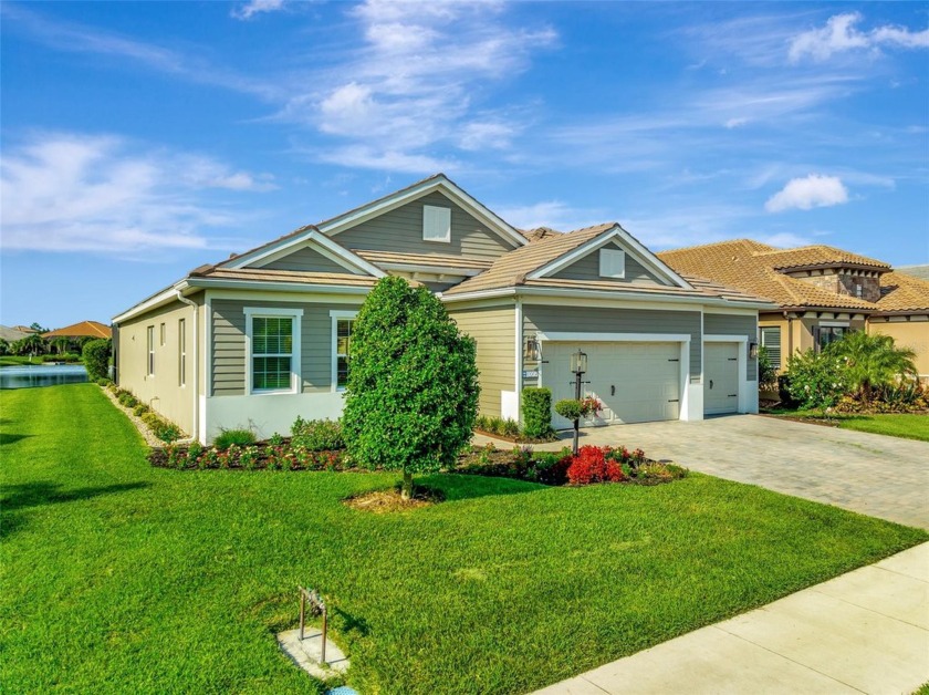 Welcome home to this beautifully appointed and thoughtfully - Beach Home for sale in Bradenton, Florida on Beachhouse.com