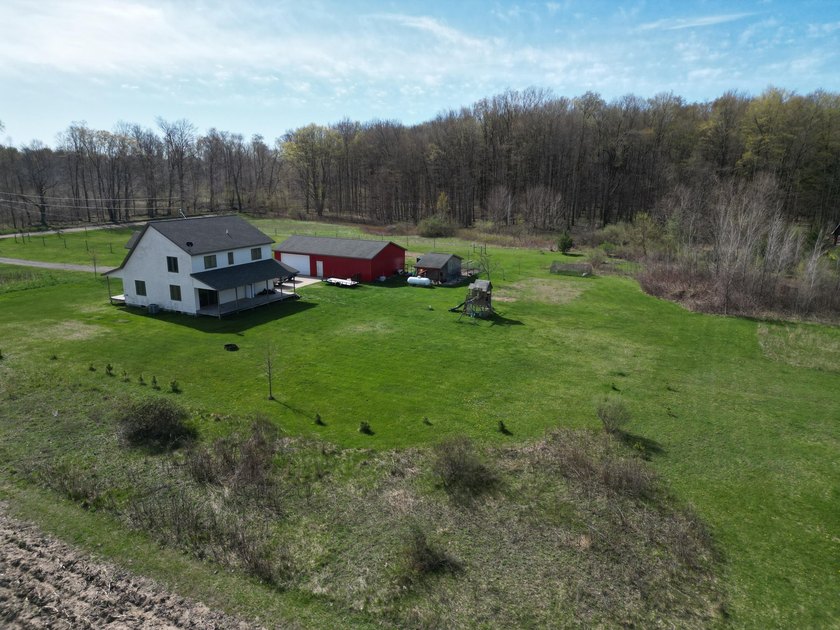 Welcome to 11559 Williams Rd in Montague, MI! Nestled on nearly - Beach Home for sale in Montague, Michigan on Beachhouse.com