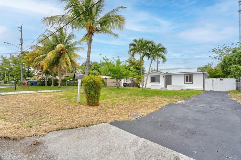 Charming 3-Bed, 2-Bath Home with Modern Upgrades and Serene Lake - Beach Home for sale in Miramar, Florida on Beachhouse.com
