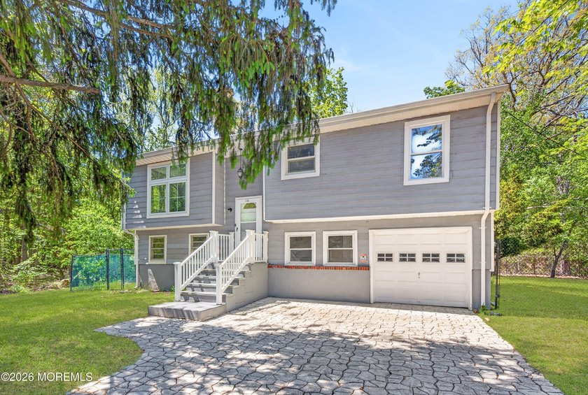 Tucked away on a quiet dead-end street, this home offers privacy - Beach Home for sale in Neptune, New Jersey on Beachhouse.com