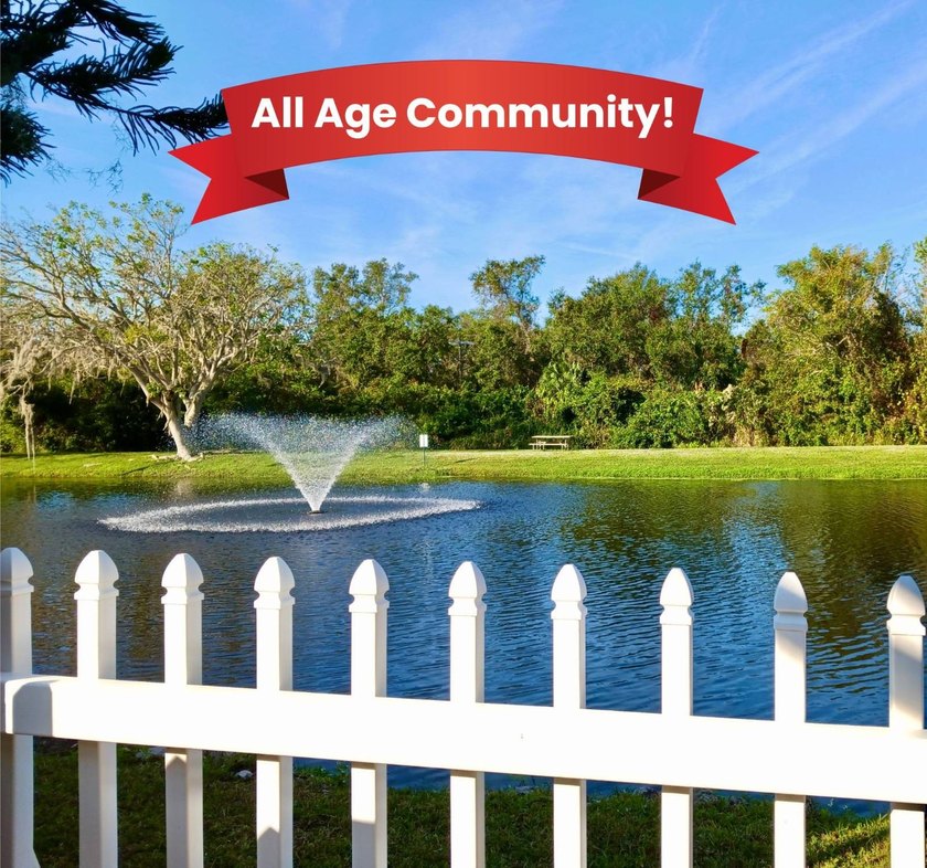 ONE-OF-A-KIND VIEW! OVERLOOKS LAKE & WATER FOUNTAIN & TREED - Beach Home for sale in Palmetto, Florida on Beachhouse.com