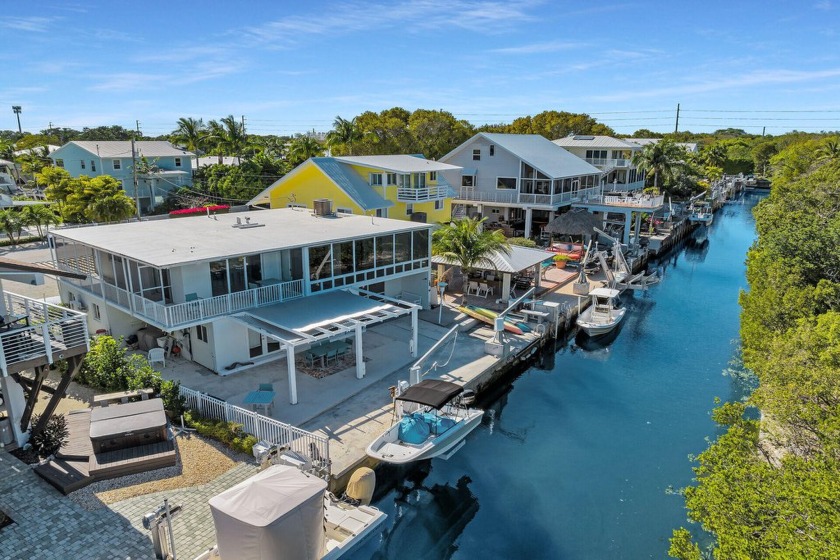 Discover luxury coastal living in this tastefully remodeled - Beach Home for sale in Key Largo, Florida on Beachhouse.com