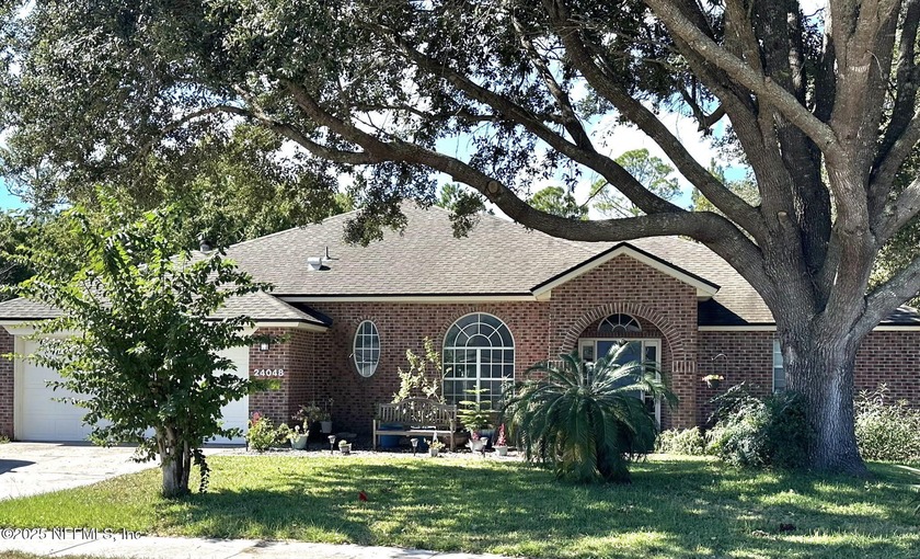 Stunning ALL Brick Home in the desirable Flora Parke - Beach Home for sale in Fernandina Beach, Florida on Beachhouse.com