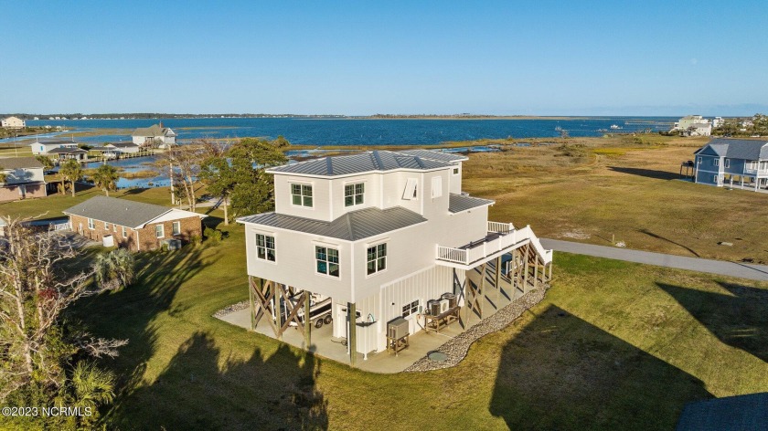 From this exquisite home, enjoy spectacular sound views on - Beach Home for sale in Harkers Island, North Carolina on Beachhouse.com