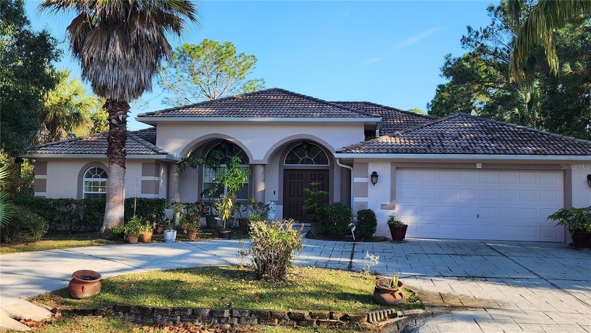 Your Dream Home Awaits in Palm Harbor, Palm Coast!  Step into - Beach Home for sale in Palm Coast, Florida on Beachhouse.com