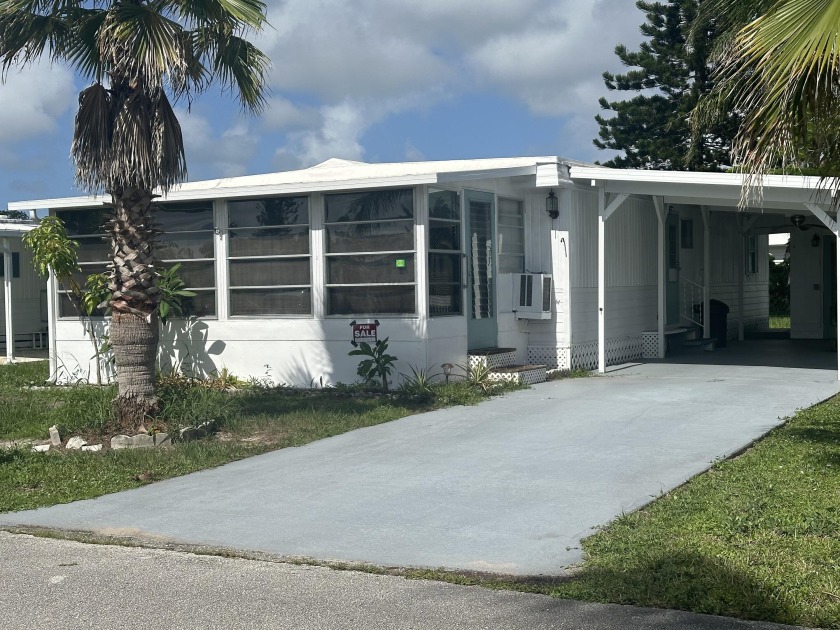 REDUCED $20,000. PLUS CREDIT OF 3 MONTHS LOT LEASE FEE. This - Beach Home for sale in Port Saint Lucie, Florida on Beachhouse.com