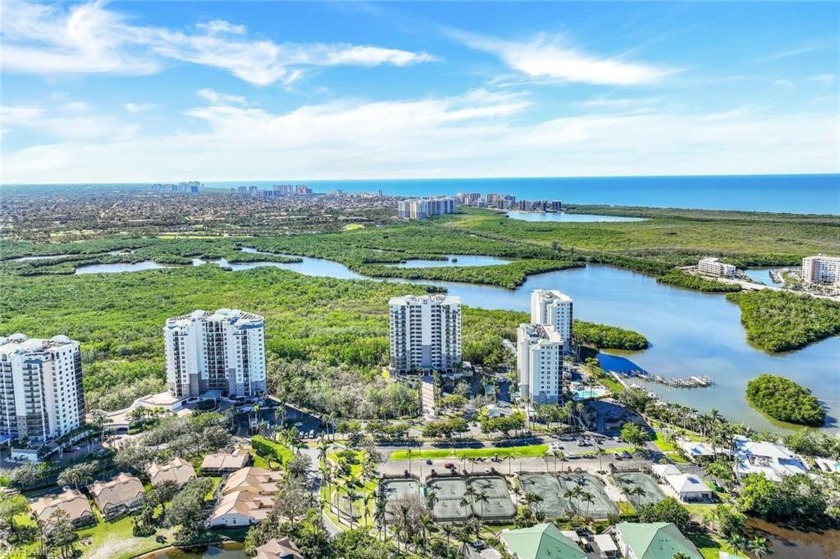 Step into this Spacious, 7th floor end unit - surrounded by - Beach Condo for sale in Naples, Florida on Beachhouse.com