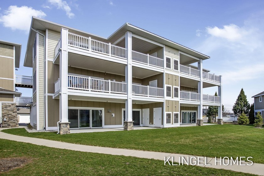 Welcome to 930 W Savidge 4, Spring Lake! Experience luxury - Beach Condo for sale in Spring Lake, Michigan on Beachhouse.com