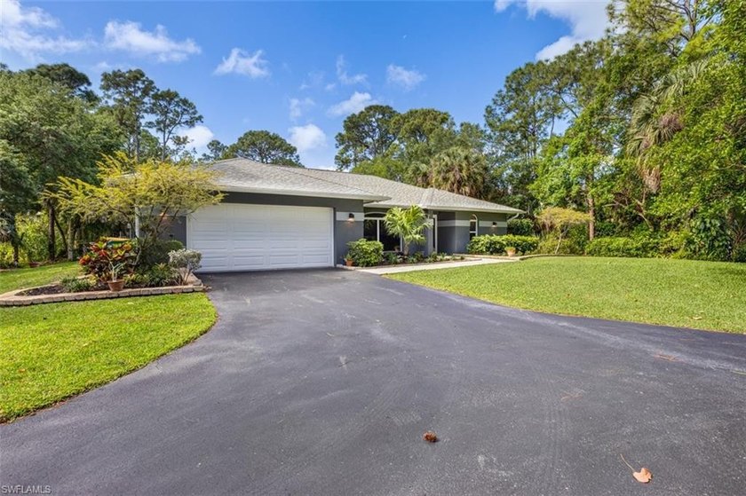 Escape to your own tropical paradise on 2.73 acres of fully - Beach Home for sale in Naples, Florida on Beachhouse.com