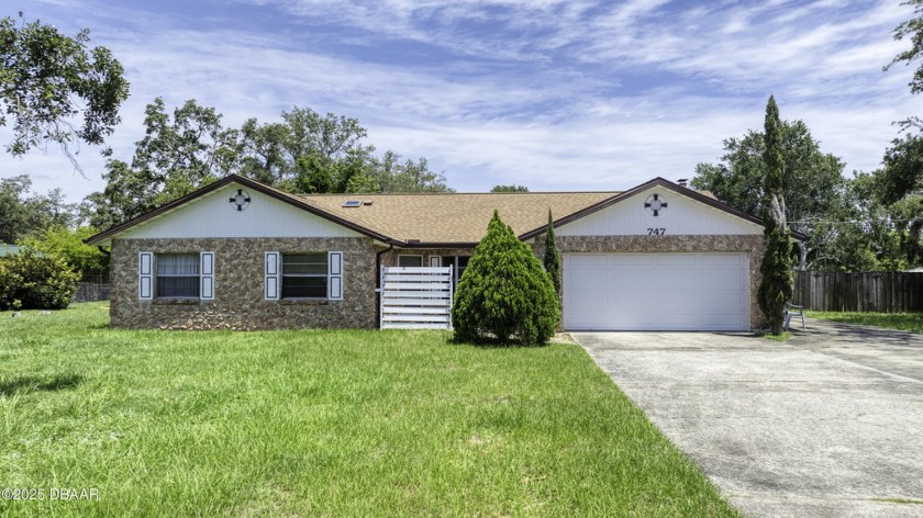 Charming 3 bedroom, 2 bath home with endless potential, located - Beach Home for sale in Port Orange, Florida on Beachhouse.com
