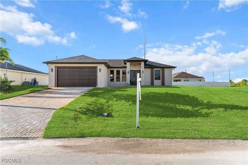 Experience the essence of modern luxury in this stunning 2026 - Beach Home for sale in Cape Coral, Florida on Beachhouse.com