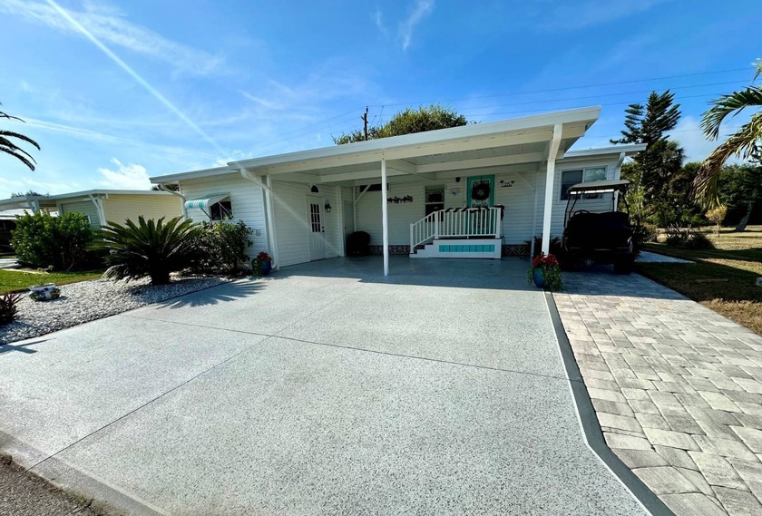 Stunning Fully Remodeled Waterfront Home in a Premier 55+ - Beach Home for sale in Nokomis, Florida on Beachhouse.com
