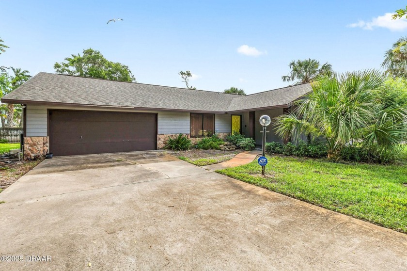 Step into timeless charm with this spacious 3-bedroom, 2-bath - Beach Home for sale in Ormond Beach, Florida on Beachhouse.com