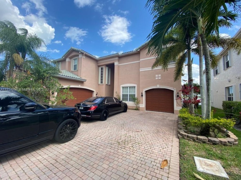 LOCATION MAKES EVERYTHING! Amazing two-story, pool home on a - Beach Home for sale in Miramar, Florida on Beachhouse.com