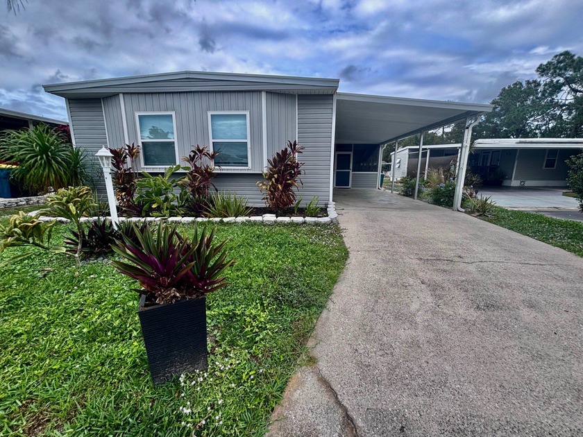 Welcome to this move-in-ready double-wide located in the - Beach Home for sale in Melbourne, Florida on Beachhouse.com