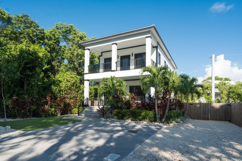 Step into a World of Elegance with Your New Home! Experience the - Beach Home for sale in Key Largo, Florida on Beachhouse.com