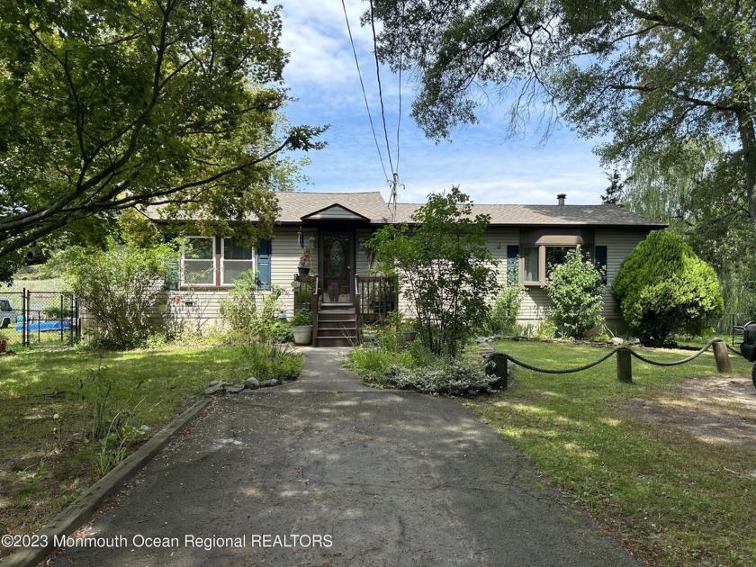 This home is all about the location.  Offering stunning views of - Beach Home for sale in Bayville, New Jersey on Beachhouse.com