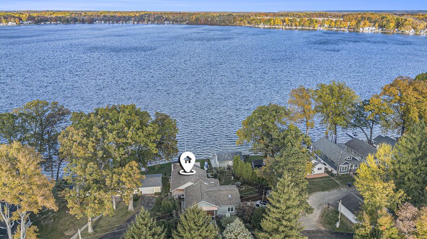 Very rare opportunity to live between lake and golf course - Beach Home for sale in Eau Claire, Michigan on Beachhouse.com