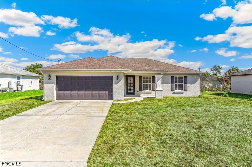 Welcome to this beautifully maintained 3-bedroom + den home - Beach Home for sale in Lehigh Acres, Florida on Beachhouse.com