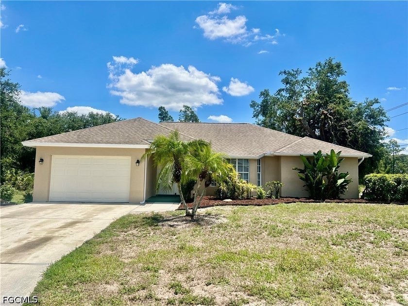 NEW DIMENSIONAL SHINGLE ROOF IN 2018, NEW WATER HEATER 2025, NEW - Beach Home for sale in Lehigh Acres, Florida on Beachhouse.com