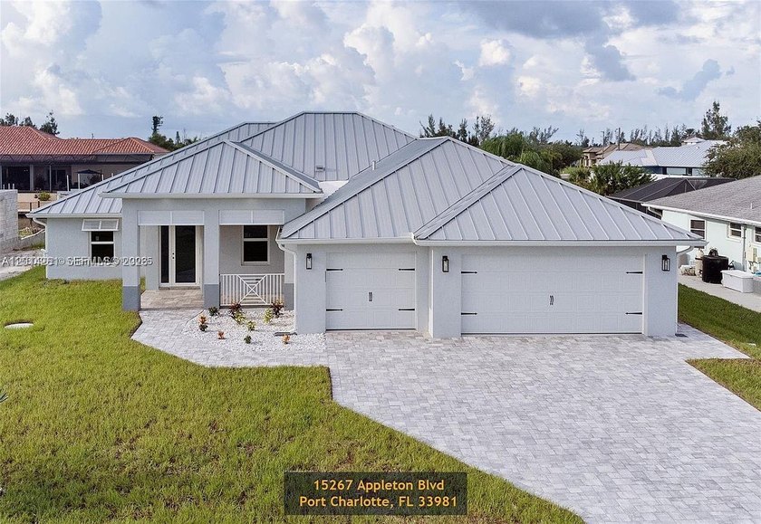 Experience refined waterfront living in this newly built 3-bed - Beach Home for sale in Port Charlotte, Florida on Beachhouse.com