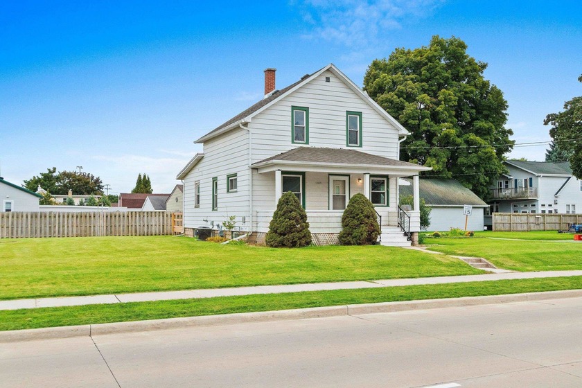 Welcome to this charming home featuring a convenient main floor - Beach Home for sale in Manitowoc, Wisconsin on Beachhouse.com